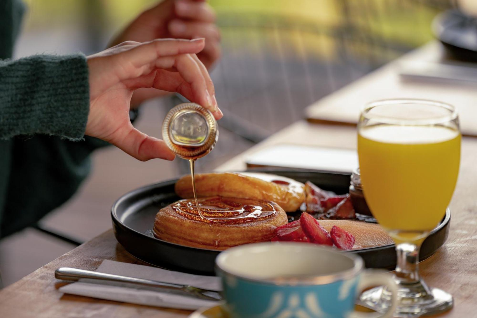 The Boato Hotel Guatapé Εξωτερικό φωτογραφία Maple syrup being drizzled on a pastry