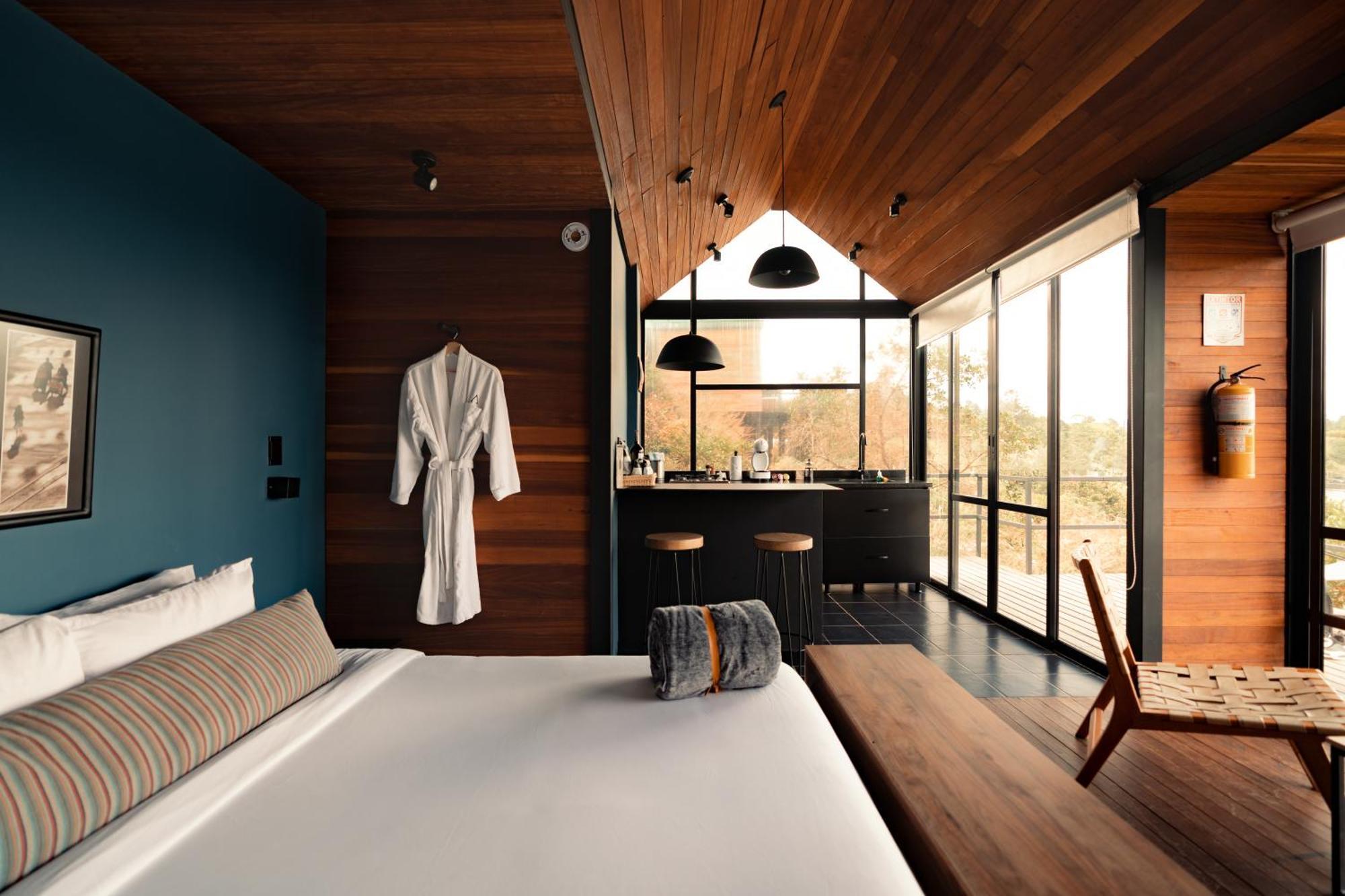 The Boato Hotel Guatapé Εξωτερικό φωτογραφία A bedroom at the hotel